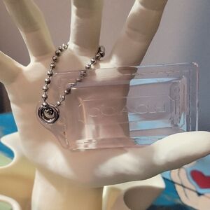 Coach Transparent Hangtag with Pink Hue And Silver Chain